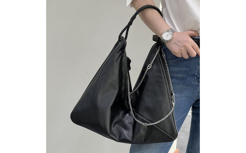 Vegetable - tanned sheepskin under - arm bag