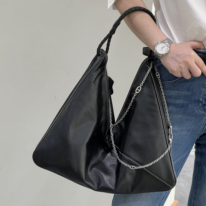 Vegetable - tanned sheepskin under - arm bag